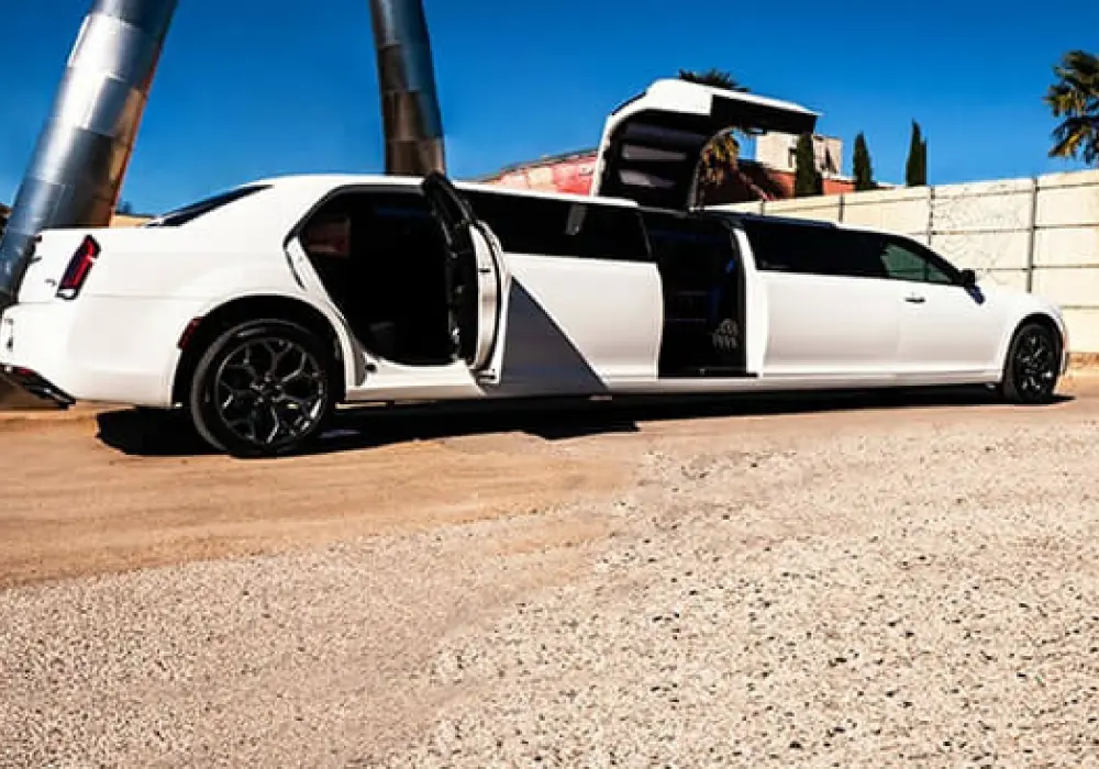 a white limousine with doors open