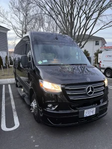 Black 14 passenger Mercedes-Benz Sprinter van exterior