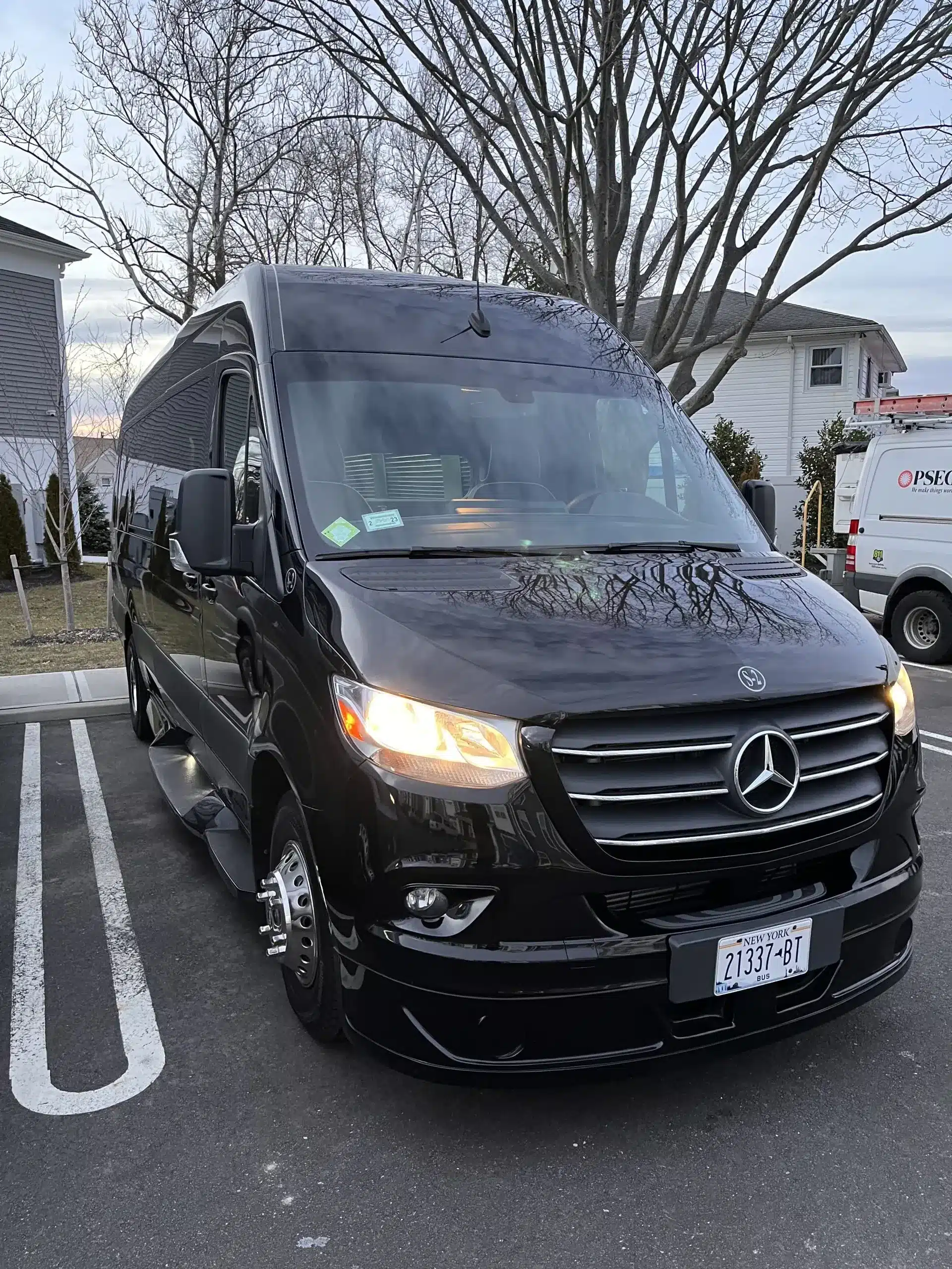 Black 14 passenger Mercedes-Benz Sprinter van exterior